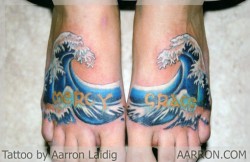 Mercy and grace wave tattoo done on feet